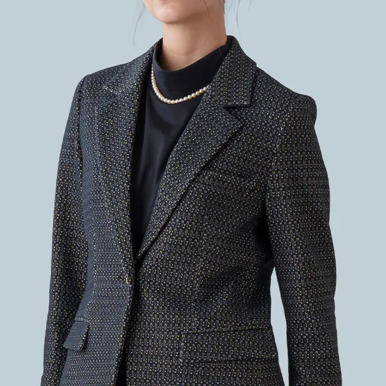 An elegant essential layer with a sophisticated side-shirred neckline