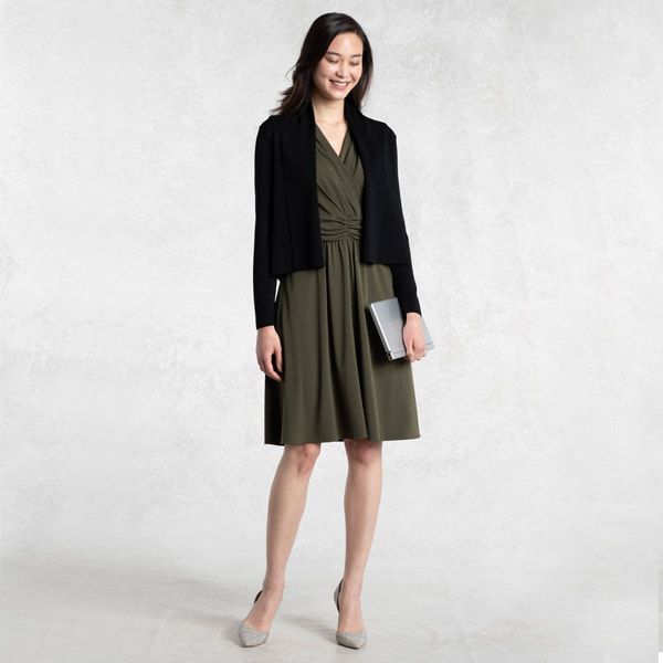 With a jacket or cardigan