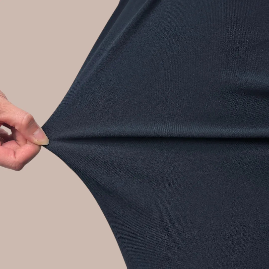 Minimalist yet meticulously engineered design that creates a perfectly flattering silhouette