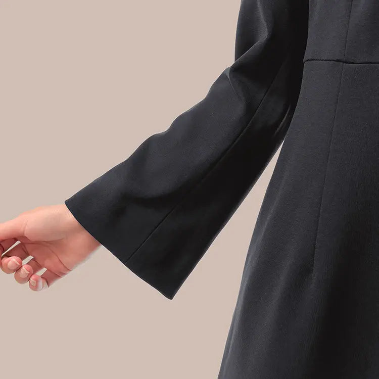 Bell sleeves accentuate your femininity with every movement