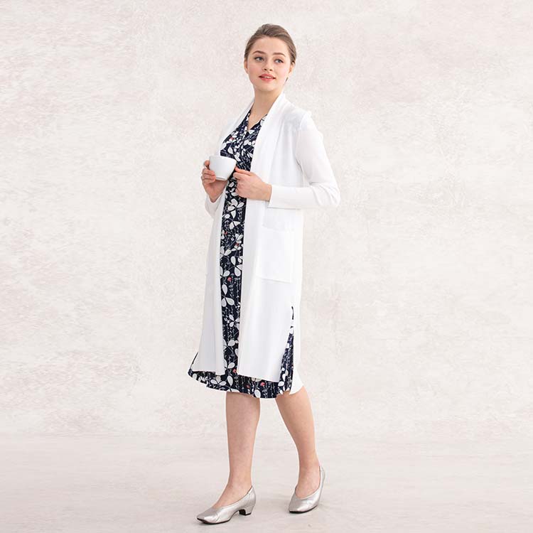 Add a touch of glamour to your office style by wearing a white cardigan