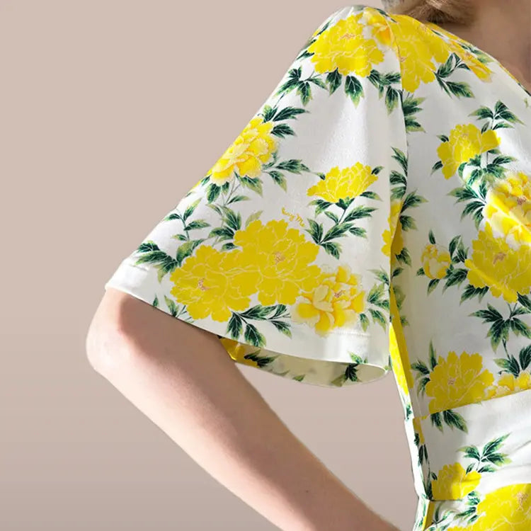 Flared sleeves to provide coverage for the upper arms.