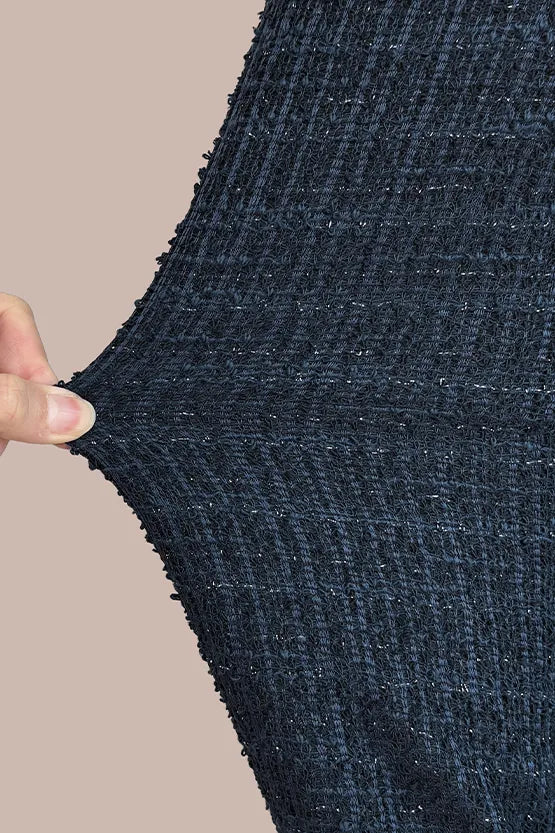 Astonishingly lightweight and comfortable, our jersey tweed adds a touch of refined elegance to your ensemble