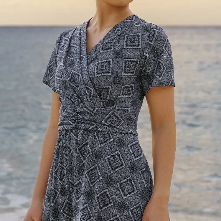 An elegant wrap design that enhances feminine grace