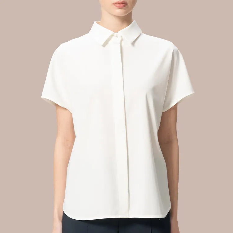 A collared blouse with a clean look. An elevated dolman blouse