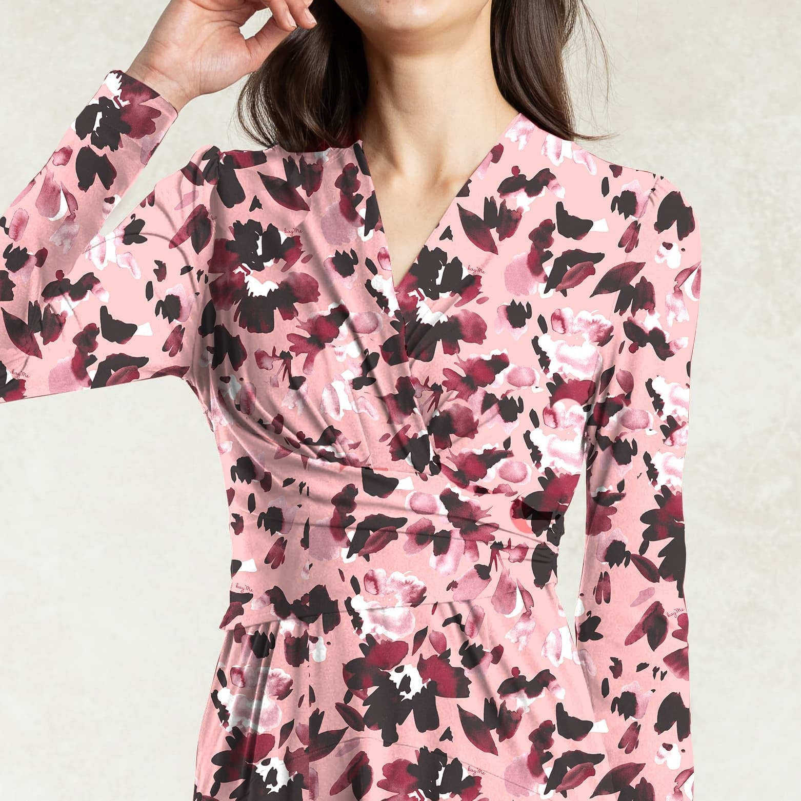 The wrap top and A-line design create a super feminine impression.