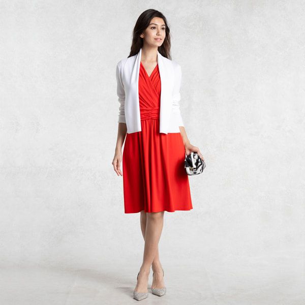 With a jacket or cardigan