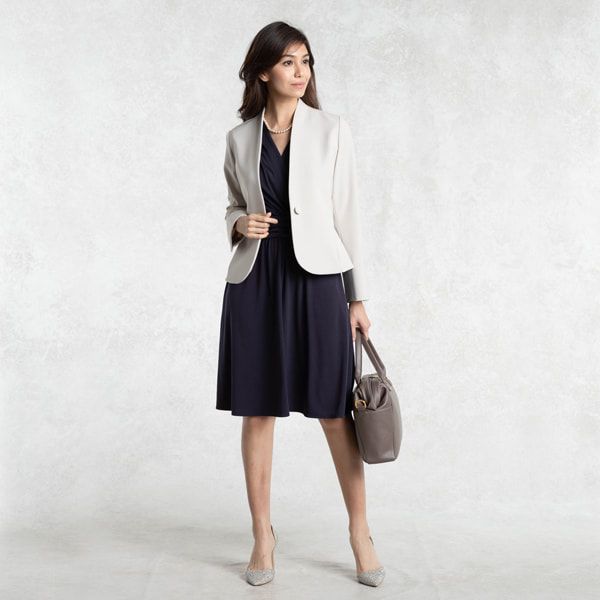 With a jacket or cardigan