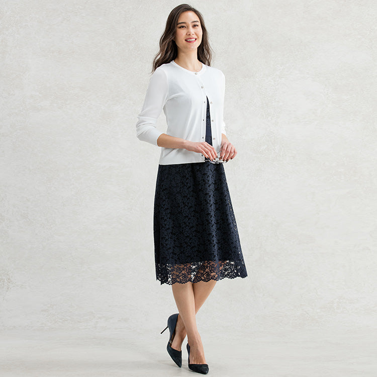 Add a touch of elegance with a white cardigan