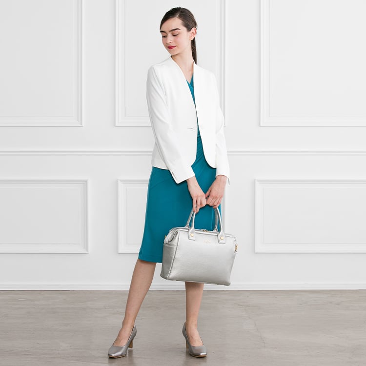 Wear it simply with a white jacket