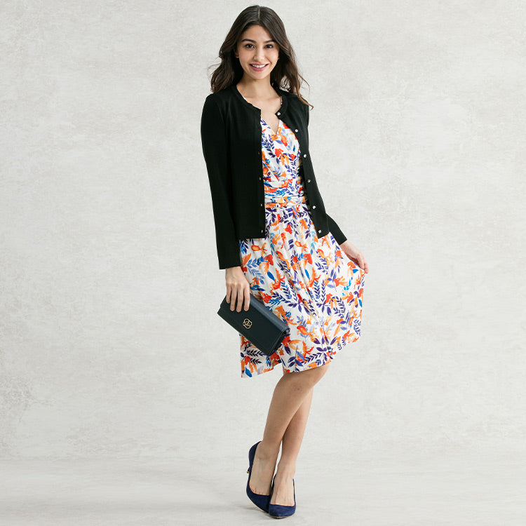 Give contrast with a navy cardigan