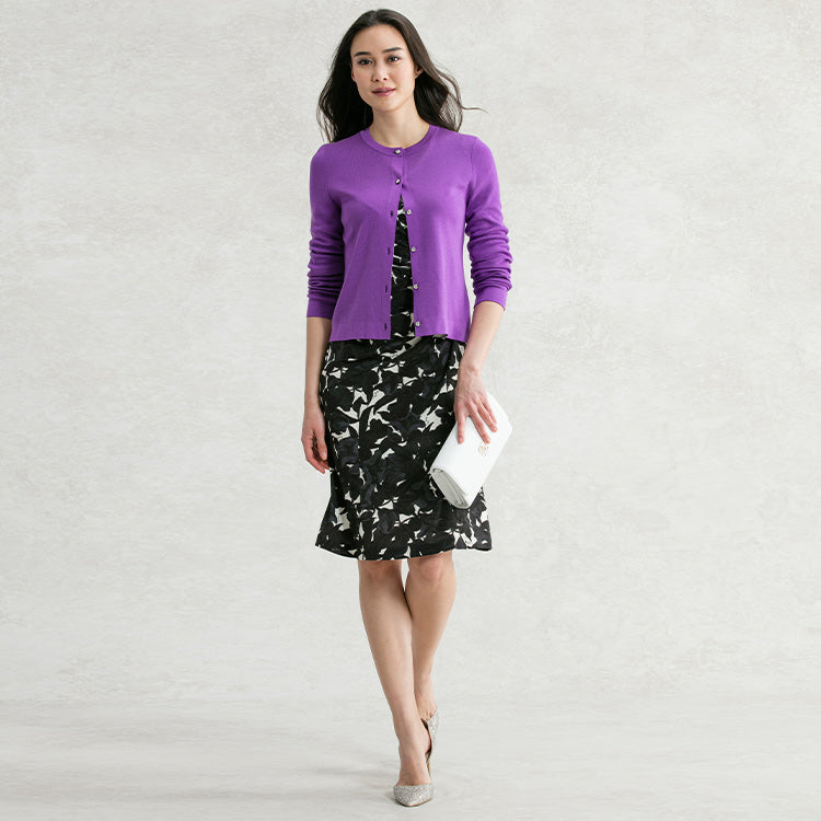 Add a purple cardigan as an accent color