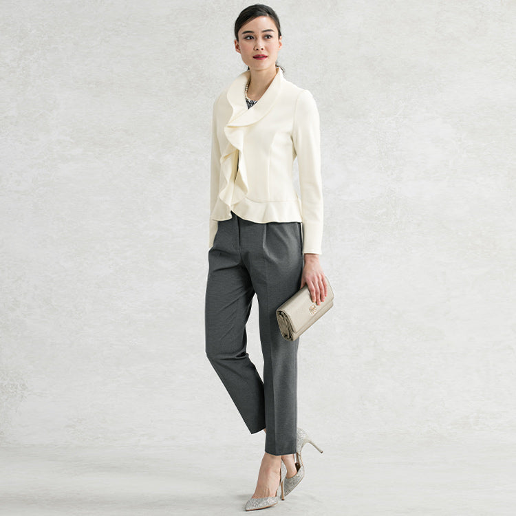 Add a feminine touch with a ruffle jacket