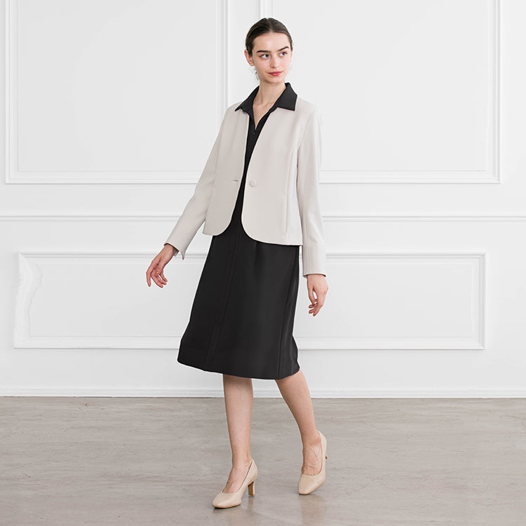 A simple and neat look with a grey jacket