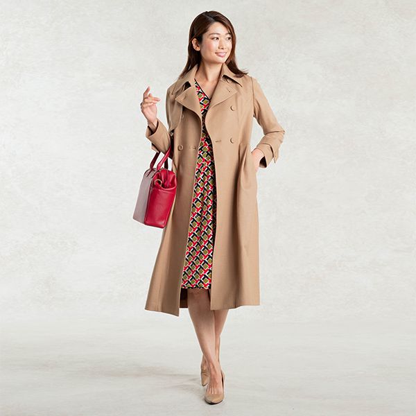 On the go with our Camel Trench Coat
