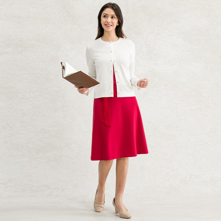 Add a touch of elegance with a white cardigan