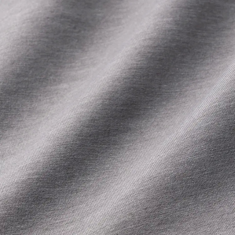 Mélange knit fabric that adds subtle nuance and shifts the impression